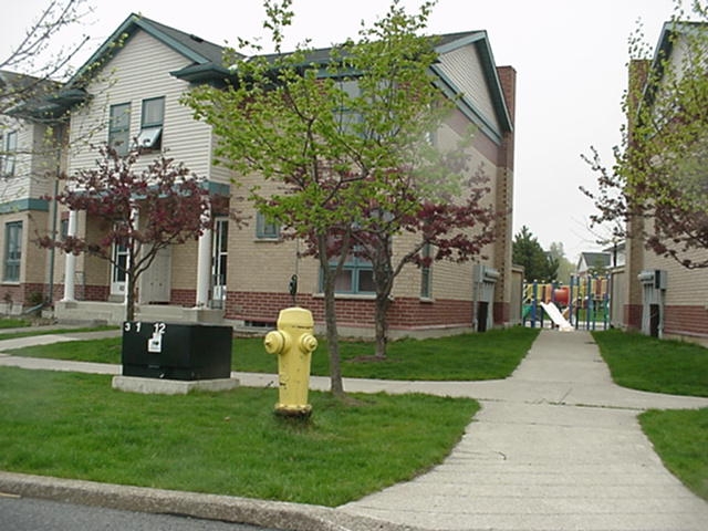 Exterior of a Unit with a playground in view in the background